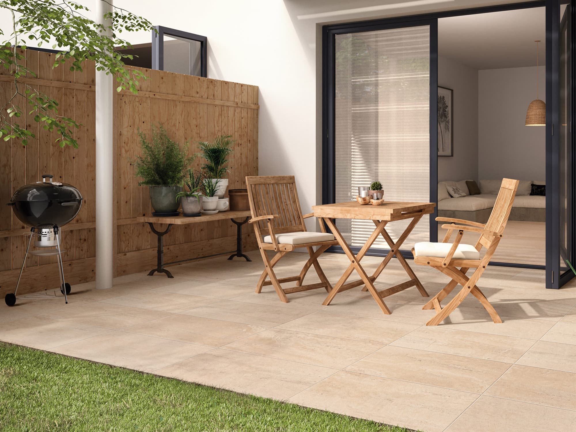 Terrasse mit Sitzgruppe auf frostsicheren Terrassenplatten